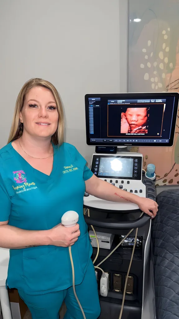 Stormy Goodwin posing with an ultrasound machine