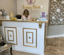 Welcoming front desk and check-in area at Peeping Moms Ultrasound Boutique. Reception area of Peeping Moms Ultrasound Boutique